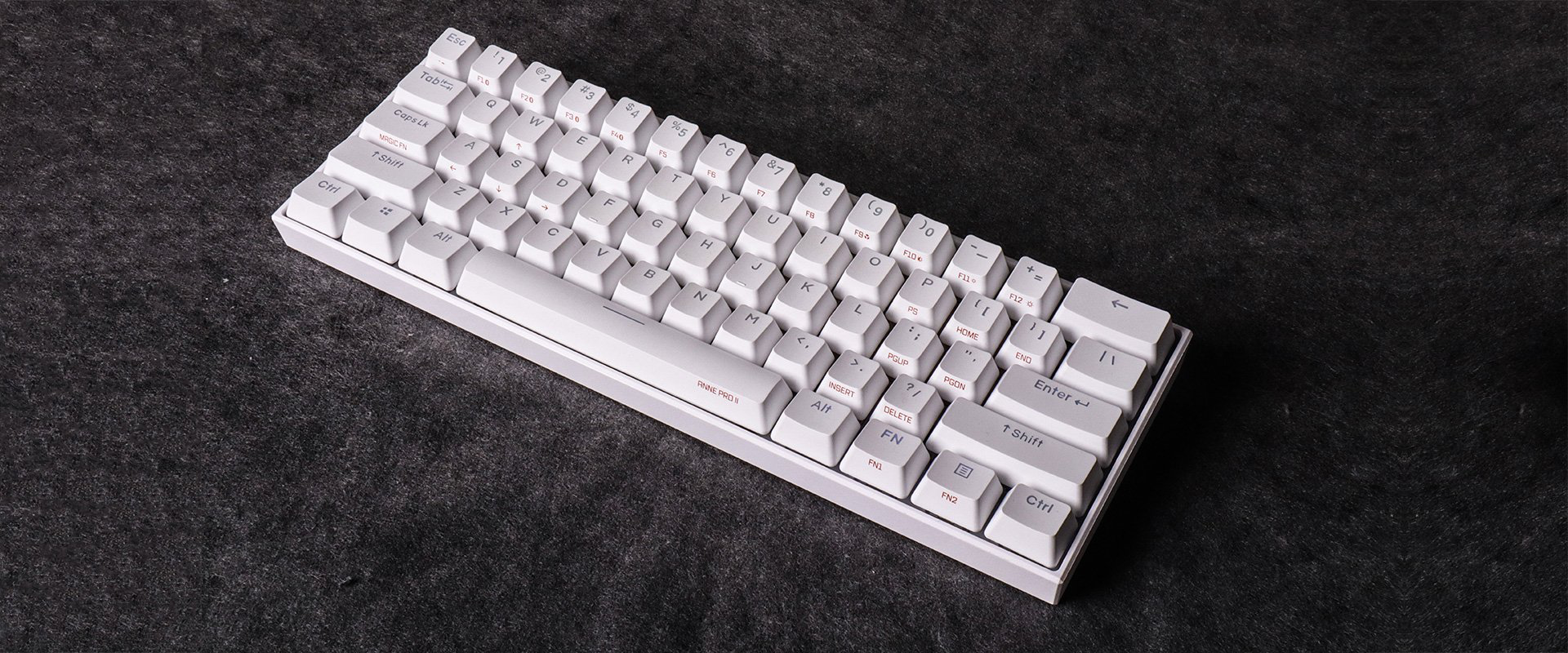 Две клавиши. Клавиатура Obins Anne Pro 2. Anna Pro 2 клавиатура. Anne Pro 2 White. Anne Pro 2 Cherry MX Red.